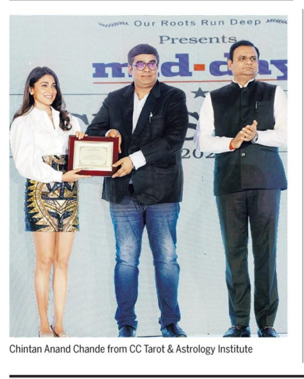 Chintan Anand Chande from CC Tarot & Astrology Institute receiving an award